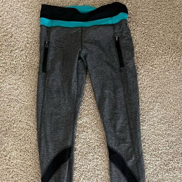 Lululemon Size 6 Gray Leggings with Mesh Cutouts and Teal at Waist - Picture 1 of 5